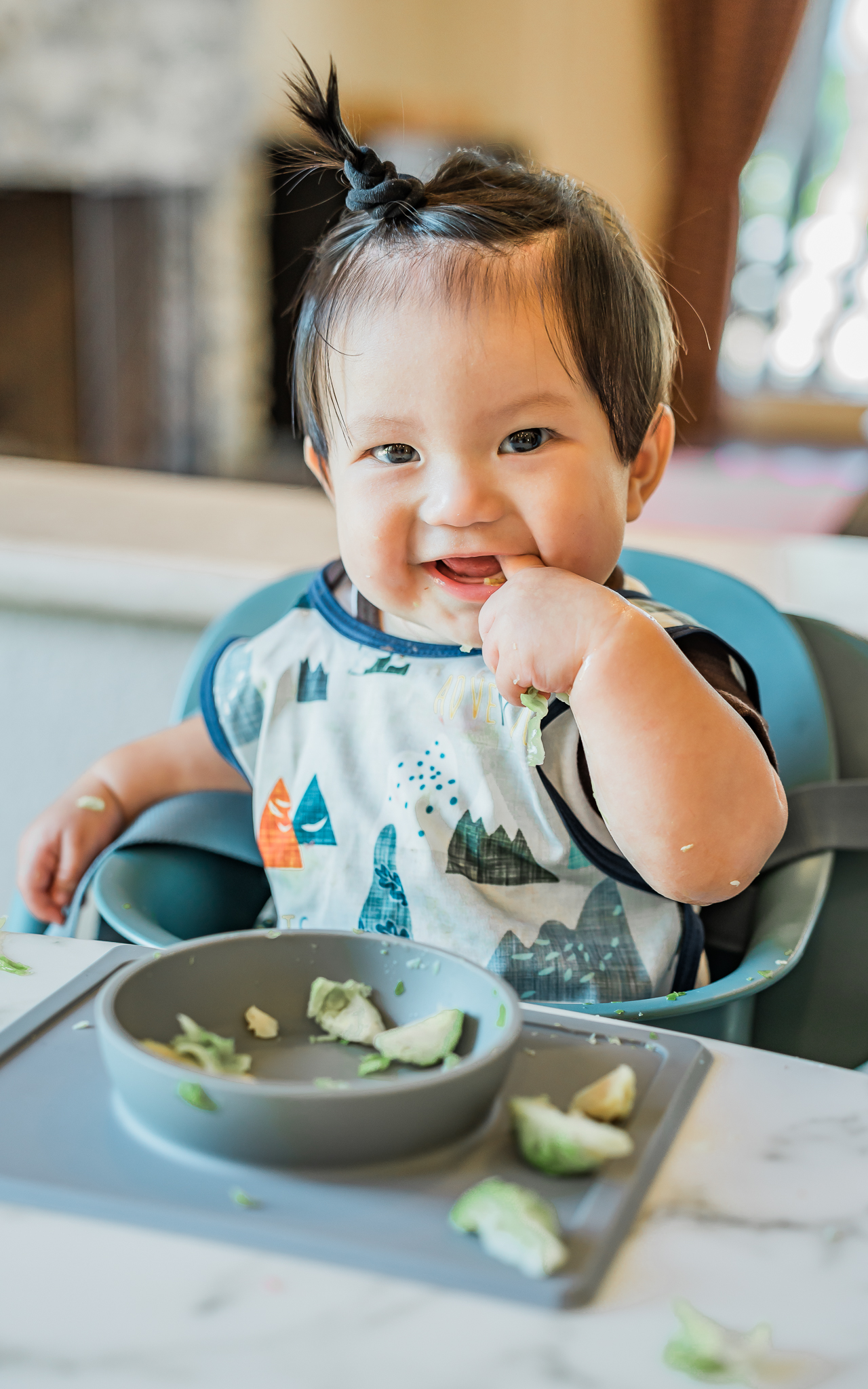 Parent feeding baby solid foods
